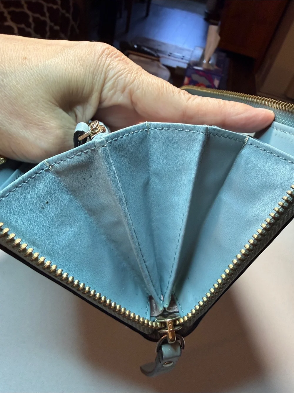 kate spade light blue pebbled gold tone zip-around wallet